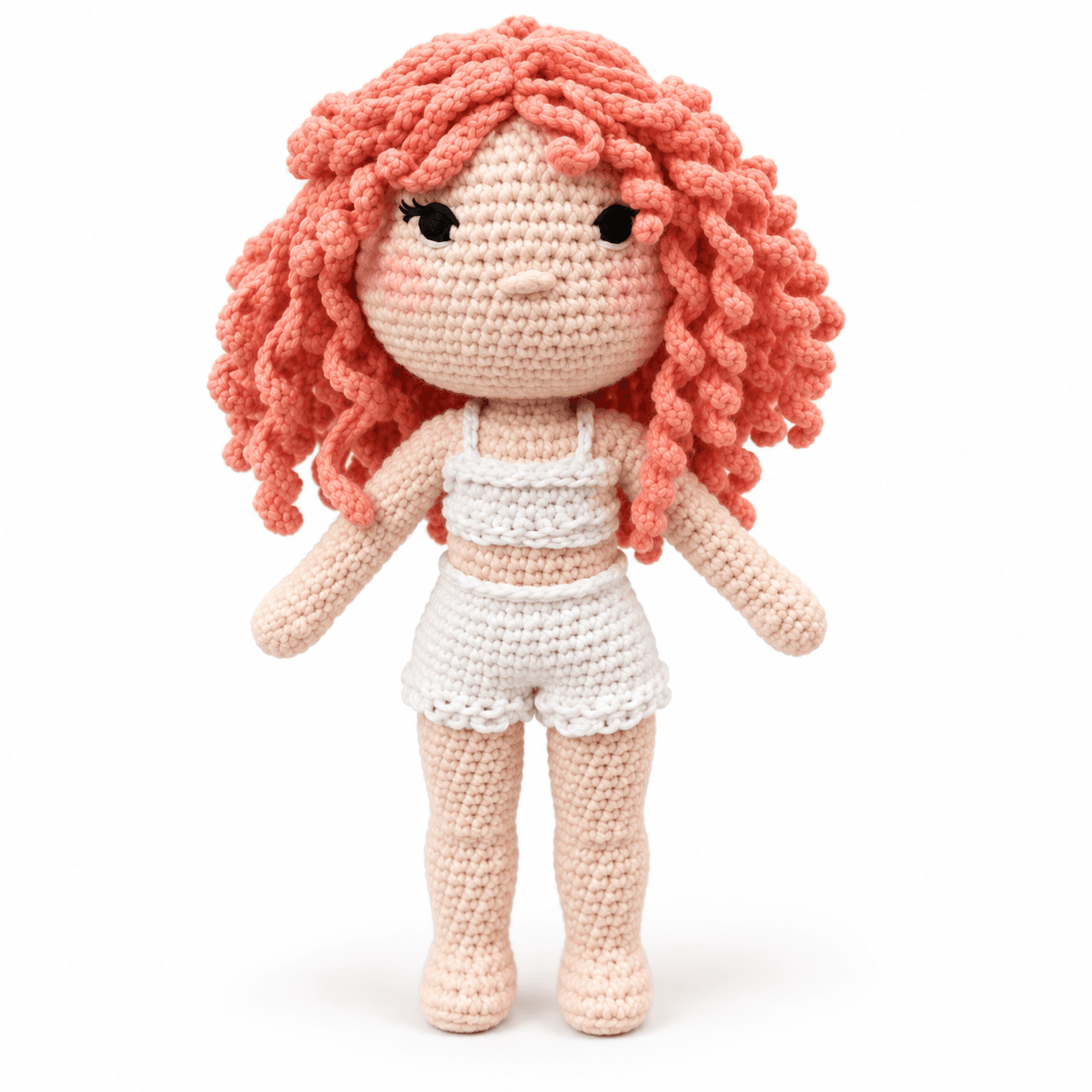 Ghita photographed straight on against white, showing the full crochet camisole and ruffled shorts.